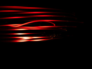 Red lines of light on a black background