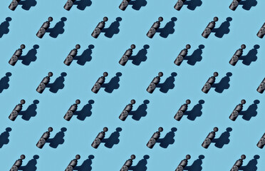 Pattern of massage gun on blue background
