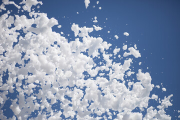 foam party, blue sky with fluffy foam and a place for text. 
