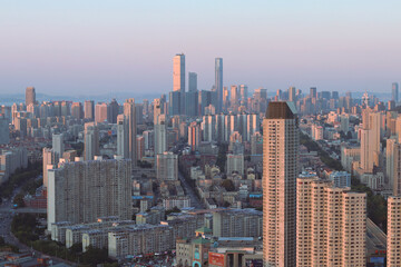 Obraz na płótnie Canvas Dalian city skyline ay the sunset