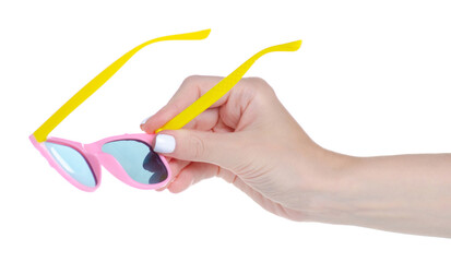 Pink sunglasses for girl baby in hand on white background isolation