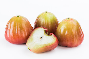 Taiwanese wax apples with leaves isolated on white background