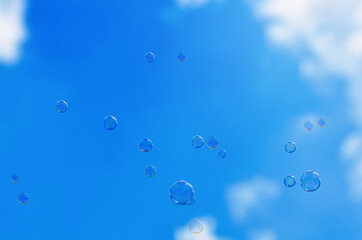 soap bubbles on a blue sky background