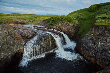 Waterfall on the river in the Kola tundra.