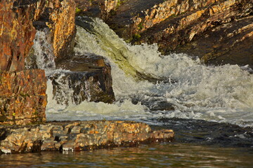 Waterfall on the river in the Kola tundra.