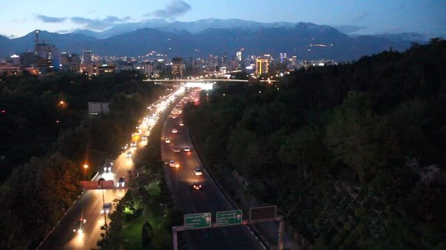 Evening view of Modares highway and Alborz mountain range in Tehran