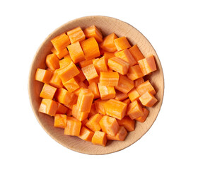 dice carrots in a wooden bowl isolated on white background, top view.