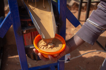 Peanut butter harvesting from an electric peanut grinder