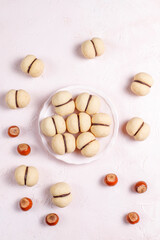 Baci di dama homemade Italian hazelnut biscuits cookies with chocolate.