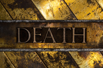 Death text on vintage textured grunge copper and gold background