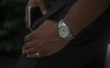 black man with fashion watch