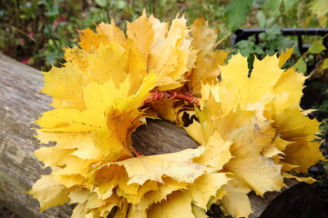 A wreath of yellow maple leaves. High quality photo