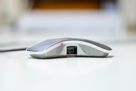 A Video conferencing microphone in a table
