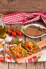 Rye bread withsweet  corn, basil and tomato.