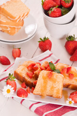 Lemon pound cake with honey and fresh strawberries.