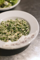 Fototapeta premium cauliflower salad with herbs. restaurant dish