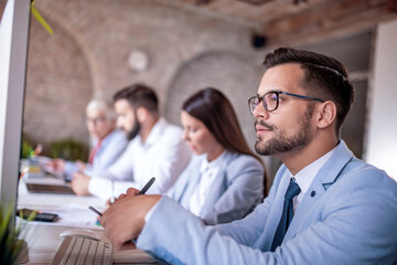 Group of people work in office