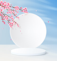 Minimalistic background with a cylindrical empty pedestal and a round wall. Product display platform with decorative pink flowers and blue sky.