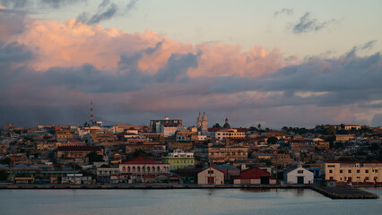 Beautiful view if Santiago de Cuba city during sunset from the port side