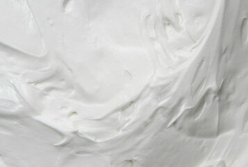 white whipped texture. latte foam, whipping cream, frothy egg white. whipped cream background.