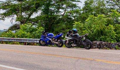 Two Motorcycles Parked on the Side of the Road on Dragons Tail in North Carolina