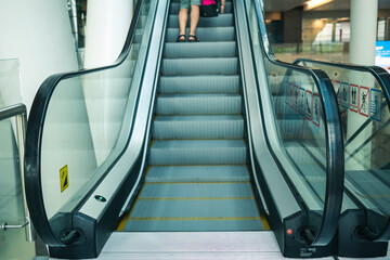 Airport Platov, Russia - 24.05.19: clean escalator closeup at the airport. beautiful modern escalator bottom-up view