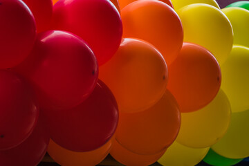 Closeup of colorful red orange and yellow balloons