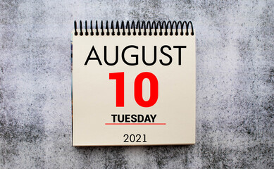 Save the Date written on a calendar - August 10