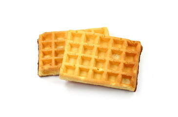 Freshly baked belgian waffles isolated on white background.