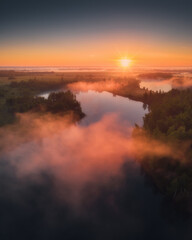 Aerial drone view of nature landscape. Colorful sunrise in Romantsevskiye Gory, Konduki in morning. Tula oblast, Russia. Popular weekend destination