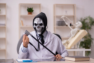 Reaper grim doctor examining skeleton patient