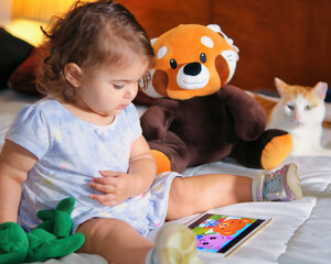 child playing with their toys