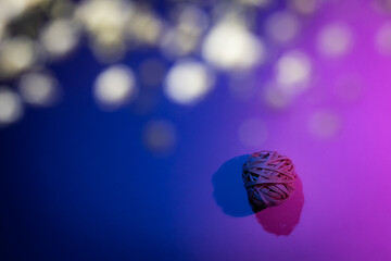 Abstract Holliday background with decorative ball in the bottom right