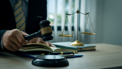 Lawyer's Office. Goddess of Justice with scales and hammer judges at lawyers working on laptops, legal documents and concepts of justice.