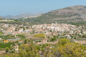 Fototapeta na wymiar Parcent in distance from Coll De Rates mountains, Spain