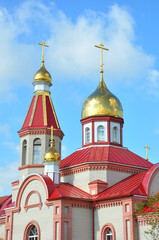 Fototapeta na wymiar Orenburg, Russia: Gilded dome of the Christian Orthodox Church in the summer 