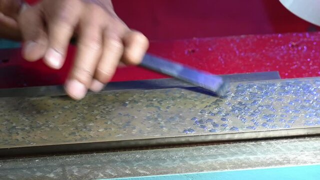 The scraping process at machine bedplate by skill worker. The machine fitting preparation process by scraping process.
