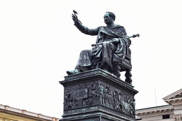 Fototapeta premium Maximilian Joseph's statue in front of the National Theatre. Locate in Munich, Germany.
