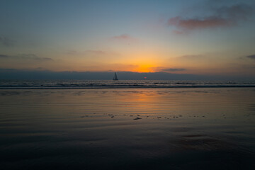 Fototapeta premium Sunrise over the sea and beautiful cloudscape. Colorful ocean beach sunset.