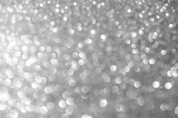 Gray bokeh background happy new year 2022. black and white abstract glister effect light night out of focus circle wallpaper. for christmas party celebration holidays or technology background concept.