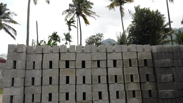 Shot of construction material along the road, Cement blocks footage