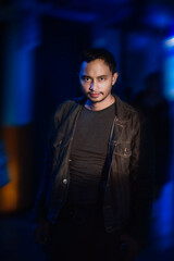 Attractive men with aggression.under the subway tunnel light