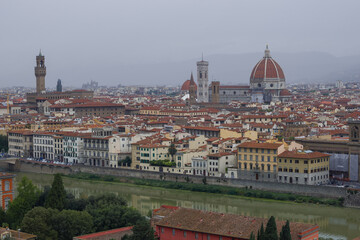 Fototapeta na wymiar View of the historic center of Florence on a foggy September morning. Italy