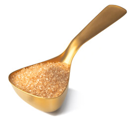 yellow sugar in the metal measuring spoon, isolated on white background