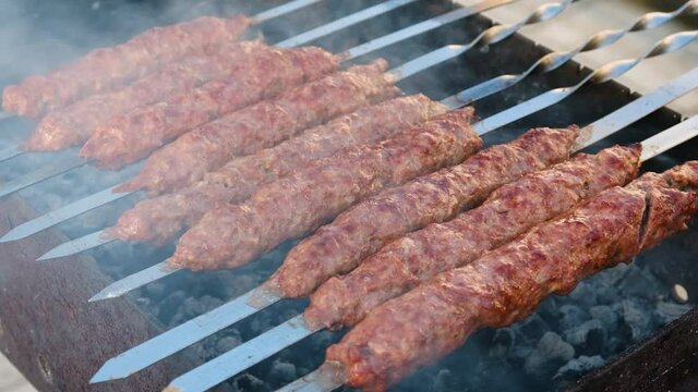 Fry lula kebab on skewers. Selective focus.