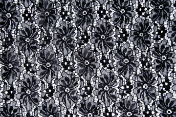black floral lace pattern on white background
