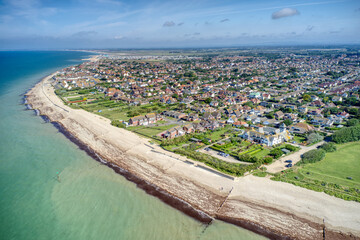 Selsey Bill aerial view over south beach and the popular seaside resort town of Selsey in West Sussex.