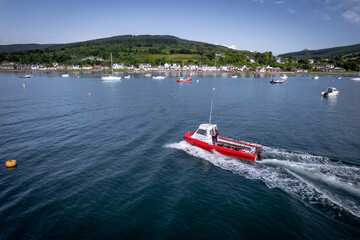 Fototapeta premium A Passenger Ferry Arriving at Port in the Summer