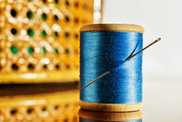 Blue thread and needle