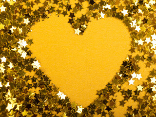 valentines day heart of gold stars on a yellow background